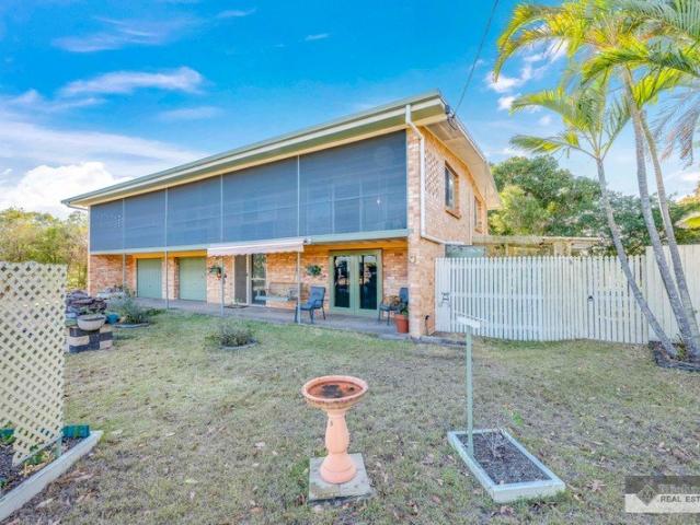 Spacious 4 Bedroom Brick Home on a Large Block