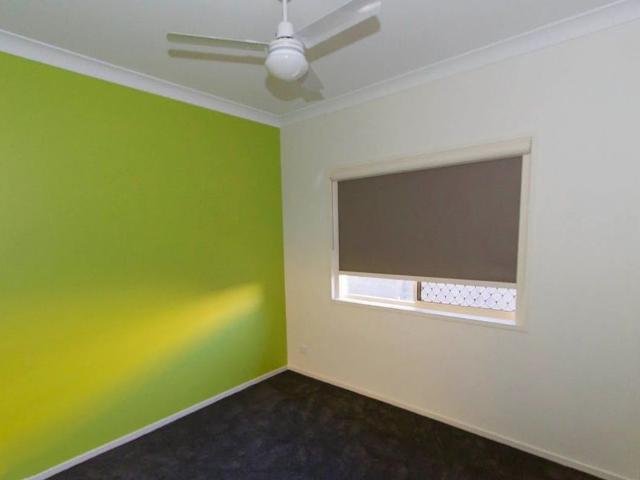 SPACIOUS 4 BEDROOM FAMILY HOME WITH AIR CONDITIONING AND OUTDOOR ENTERTAINING AREA