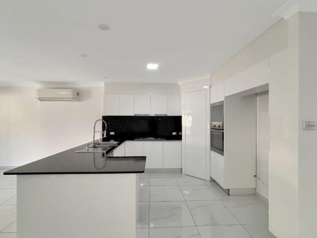 Spacious 4 Bedroom Family Home with Double Garage – Prime Rooty Hill Location