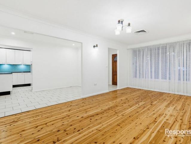 Spacious 4 Bedroom Family Home with Huge Garage & Entertainer's Deck