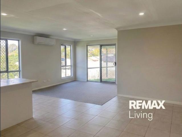 Spacious 4 Bedroom Family Home with Huge Yard!