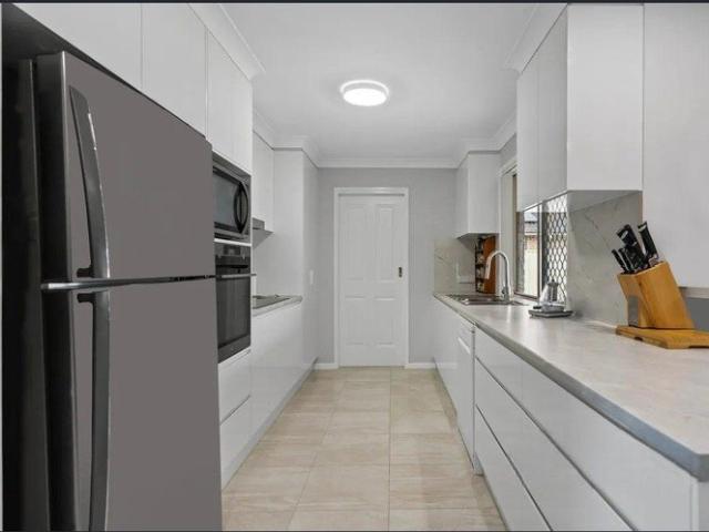 Spacious 4 Bedroom Family Home with Large Backyard & Shed