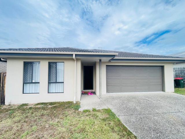 Spacious 4 Bedroom Family Home with Media Room, Deck & Solar in Carseldine