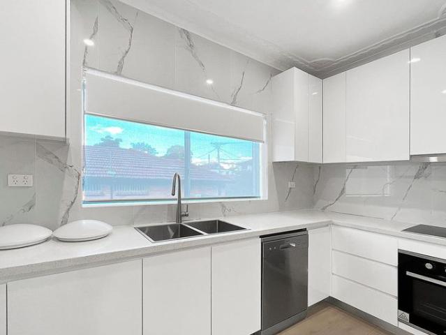Spacious Freshly Painted 4 Bedroom Home