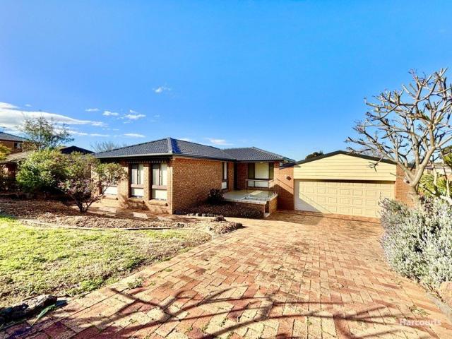 Spacious 4 Bedroom Home with Outdoor Deck and Double Garage.