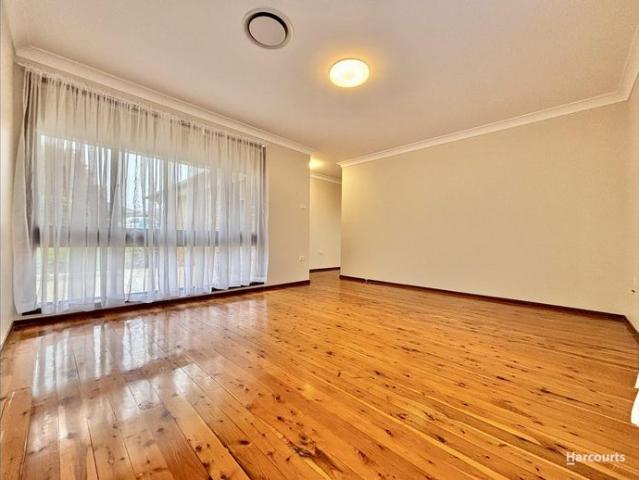 Spacious 4 Bedroom Home with Outdoor Deck and Double Garage.