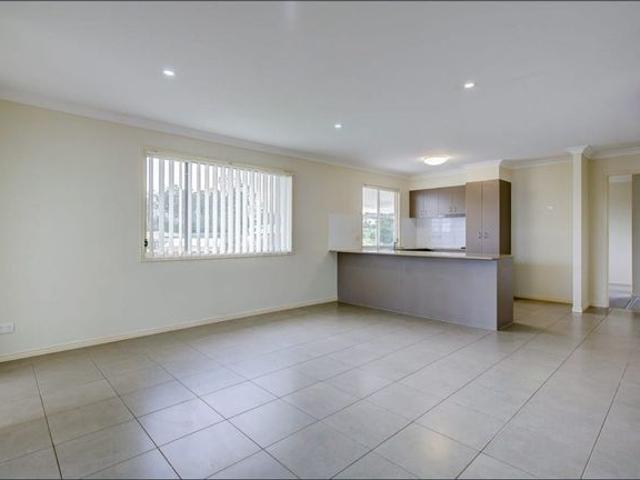 Spacious 4 Bedroom Home with Air Conditioning