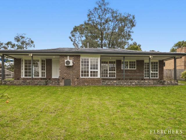 Spacious 4 Bedroom Home with Large Backyard