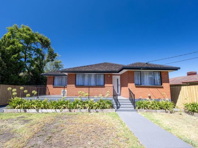 Spacious 4 Bedroom Home with Large Backyard!