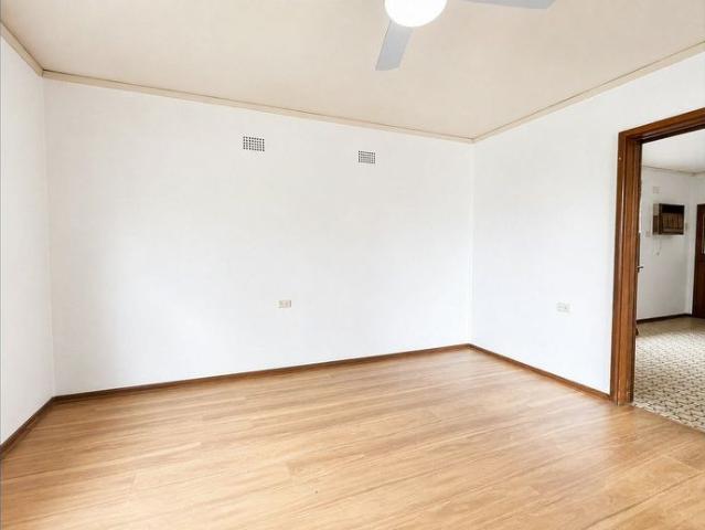 Spacious 4 Bedroom Home with Large Backyard