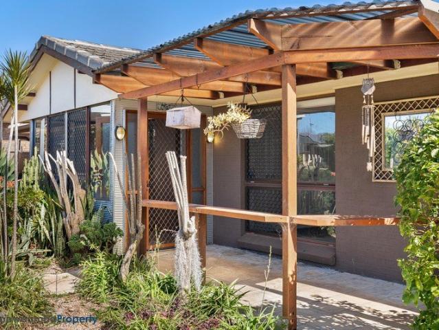Spacious 4 Bedroom Home with Large Enclosed Entertaining Area!
