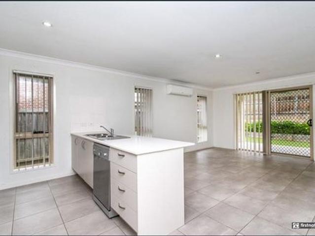 Spacious 4 Bedroom Home with Low Maintenance Yard