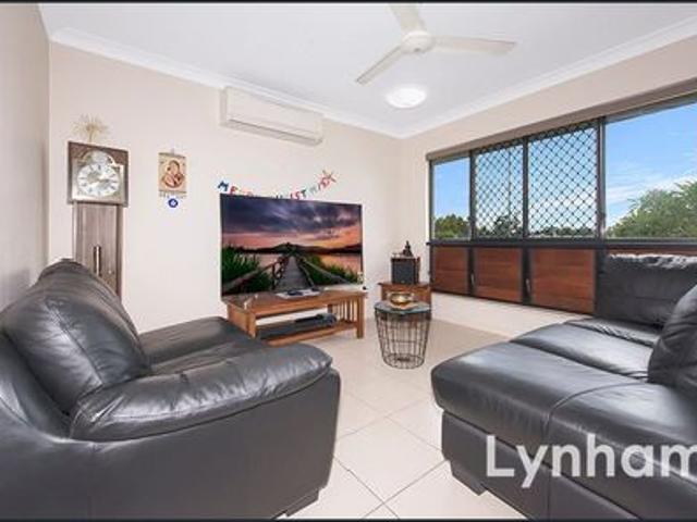 Spacious 4 Bedroom Home with Tranquil Backyard and Prime Location!