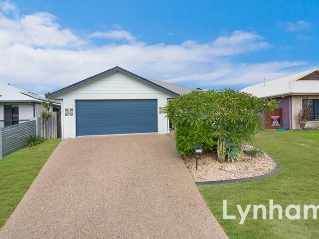 Spacious 4 Bedroom Home with Tranquil Backyard and Prime Location!