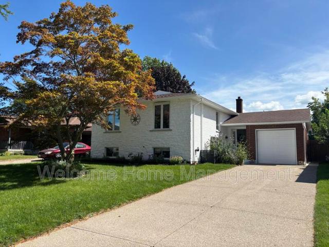 Spacious 4 Bedroom Home in St. Catharines with Two Kitchens & Private Backyard