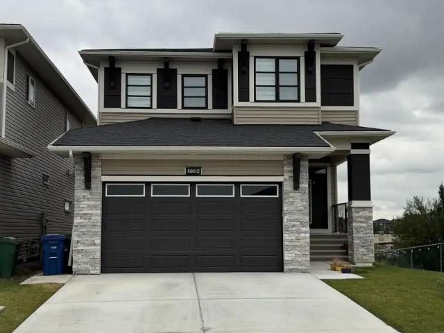 Spacious 4 Bedroom Walkout Home with Canal Views | Bayside