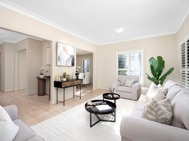 Spacious 4 bedroom Torrens title townhouse with 3 living areas and parking for 4 cars