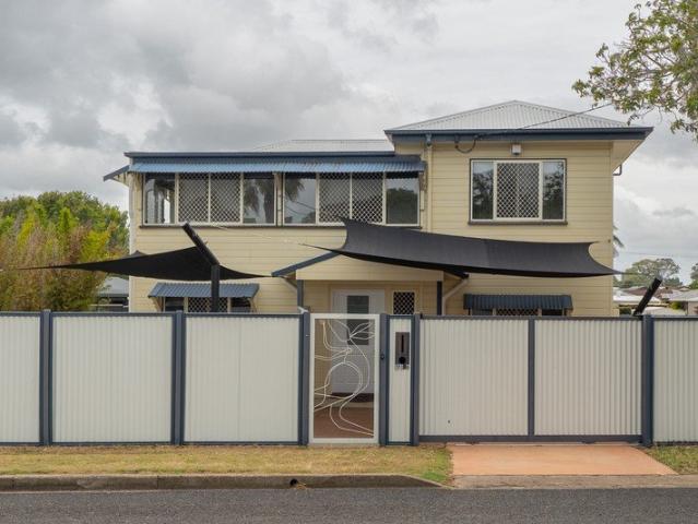Spacious 4 Bedroom Upstairs Residence with Garage, Workshop & Ample Parking