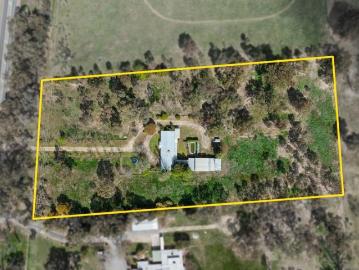 Spacious 5 Acre Retreat with Development Potential Minutes from Town!