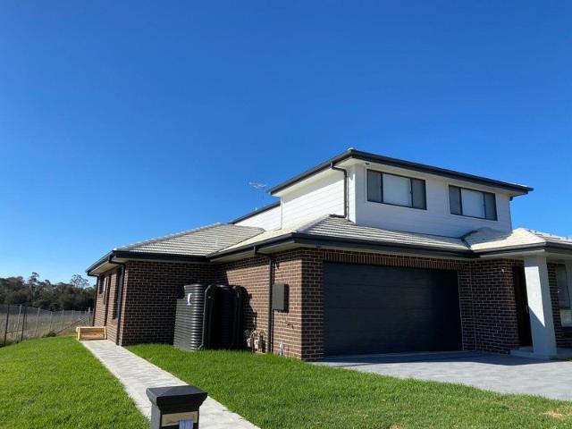 Spacious 5 Bedroom Family Haven with Dual Living Areas in Menangle Park
