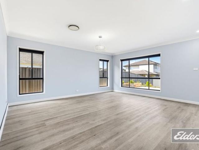 Spacious 5 Bedroom Family Home with Premium Features in Elara