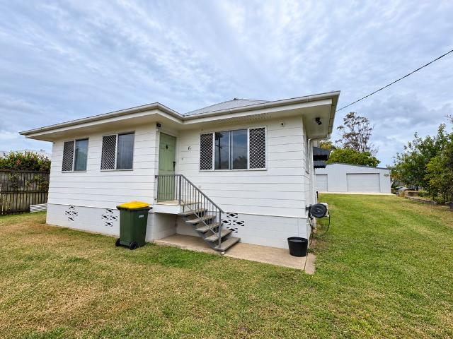 Spacious 5 Bedroom Home with Large 4 Car Shed – Bundaberg East