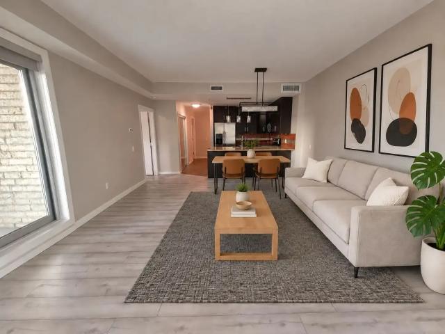 Spacious 743 Sq. Ft. 1 BR | 17th Floor | Heated Parking Included — 1 Bedroom Condo Unit