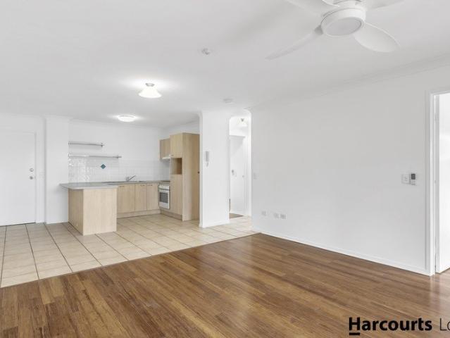 Spacious 2 Bed, 2 Bath Unit with Private Balcony & Lock Up Garage