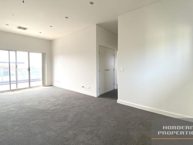 Spacious 2 Bedroom Apartment with 2 Secure Car Spaces