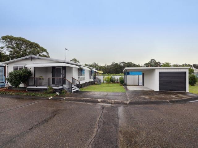 Spacious 2 Bedroom Home with Garage, Carport & Large Covered Verandahs