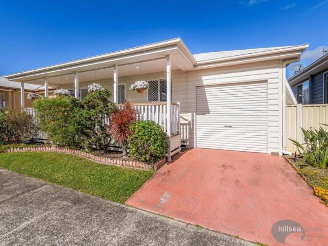 SPACIOUS 2 BEDROOM HOME IN A PRIME OVER 50'S RESORT WITH SUN FILLED NORTH FACING VERANDAH