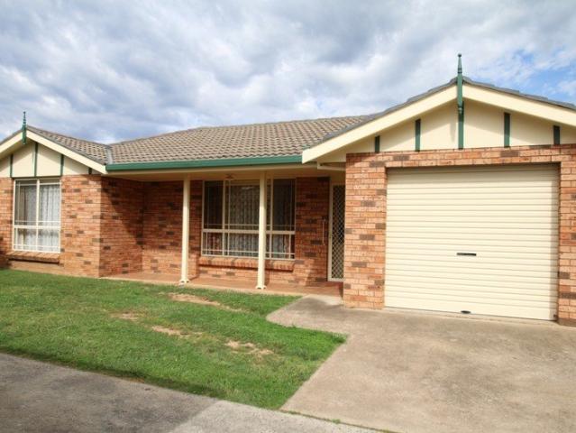 Spacious 2 Bedroom Unit with Private Yard