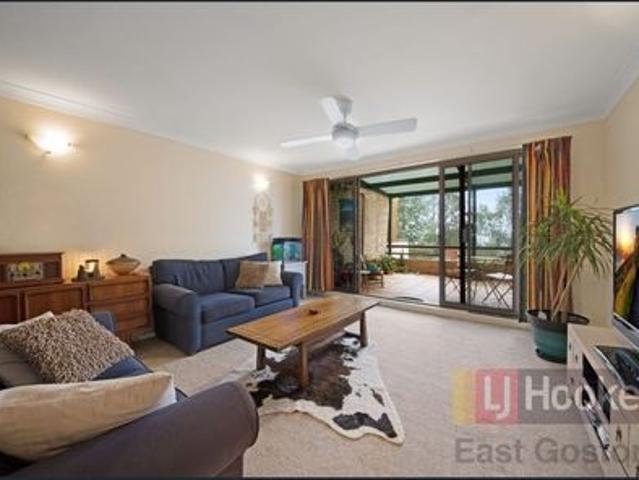 Spacious 2 Bedroom Unit with Water Views & Lock Up Garage