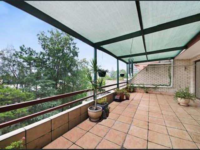 Spacious 2 Bedroom Unit with Water Views & Lock Up Garage