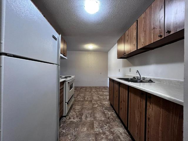 Spacious 2 Bedroom Unit in Quiet Innisfail Building!