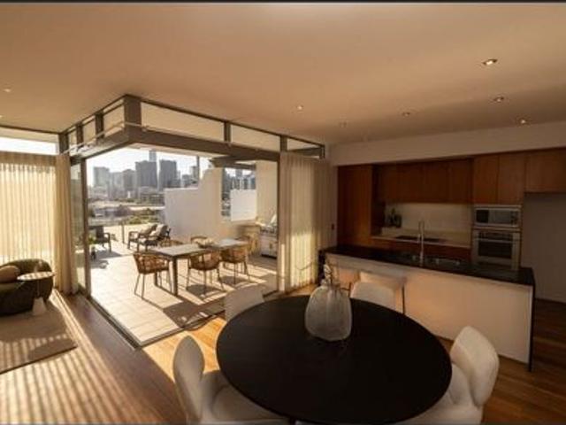 SPACIOUS 2 STOREY PENTHOUSE WITH EXCEPTIONAL VIEWS, GENEROUS INDOOR/OUTDOOR LIVING, MEDIA ROOM + OFFICE!