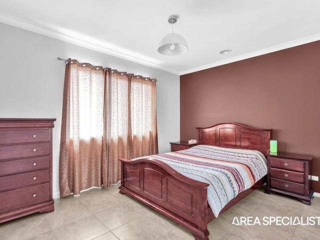 Spacious 33 Square Family Home with Butler's Pantry, Solar System & Multiple Living Areas!