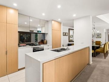 Spacious 3 bed, 2 bath + powder room, 2 car apartment in East Village