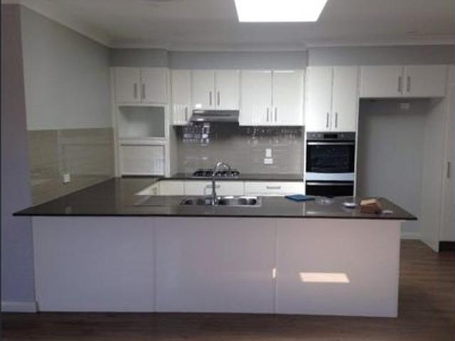 Spacious 3 Bedroom Brick Duplex With Solar