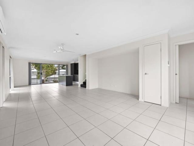 Spacious 3 Bedroom Family Home with Air Conditioned Living & Private Backyard