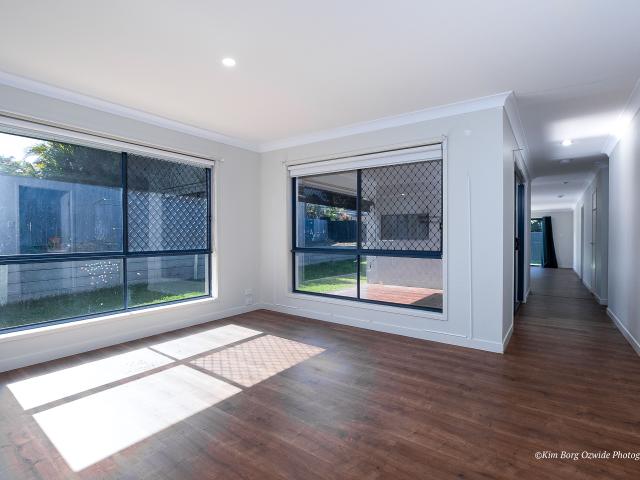 Spacious 3 Bedroom Home with Media Room, Dual Decks & Solar Power!