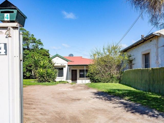 Spacious 3 Bedroom Home with Large Backyard & Shed