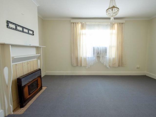Spacious 3 Bedroom Home with large backyard