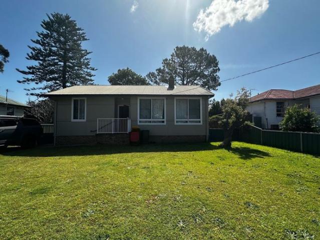 Spacious 3 Bedroom Home with Large Fenced Yard