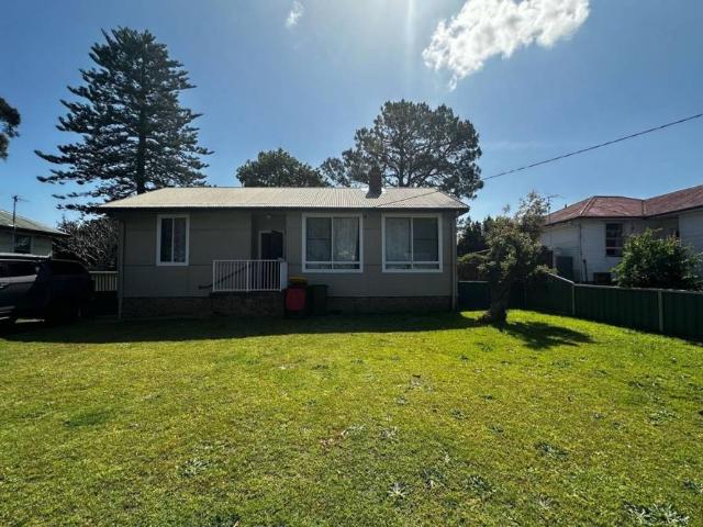 Spacious 3 Bedroom Home with Large Fenced Yard