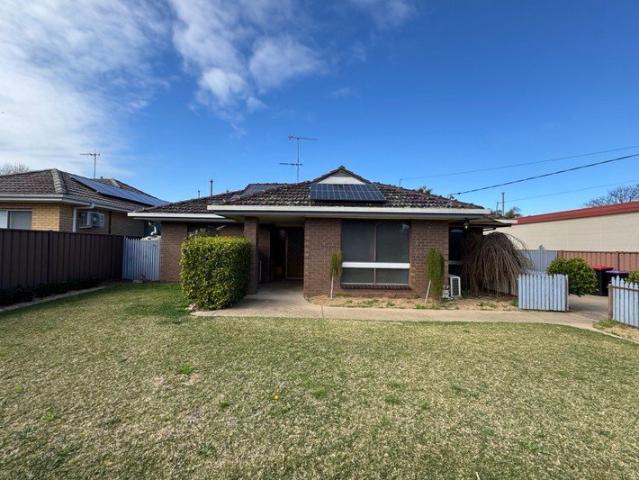 Spacious 3 Bedroom Home with Large Shed!
