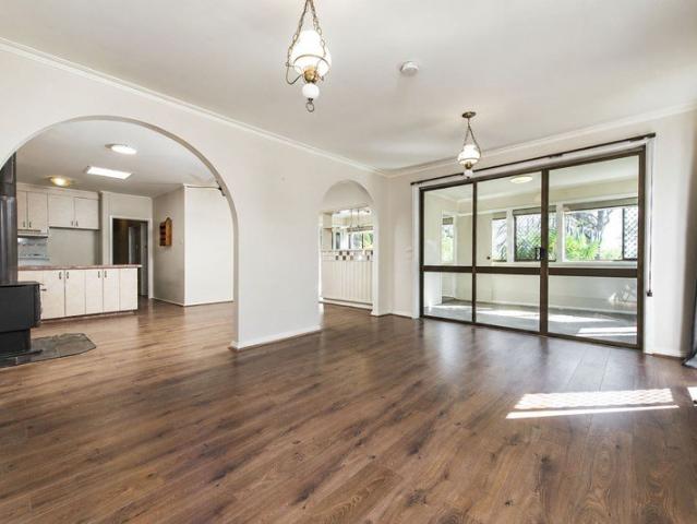 Spacious 3 Bedroom Home with Sunroom and Dual Living Zones