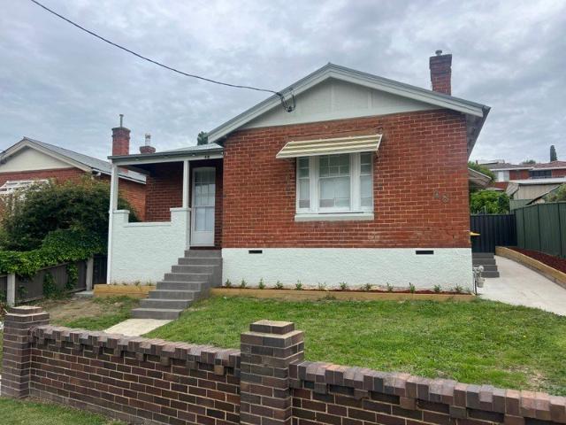 Spacious 3 Bedroom Home with Sunroom and Garden Shed