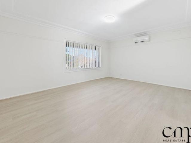 Spacious 3 Bedroom Home with Sunroom & Large Backyard