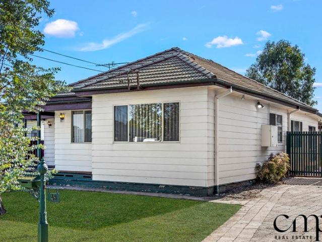 Spacious 3 Bedroom Home with Sunroom & Large Backyard